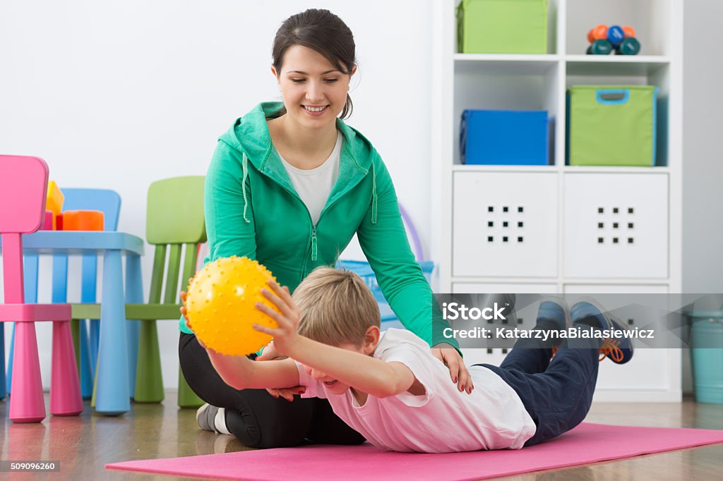 Diese Übung ist für ihre gute - Lizenzfrei Kind Stock-Foto Diese Übung ist für ihre gute - Lizenzfrei Kind Stock-Foto