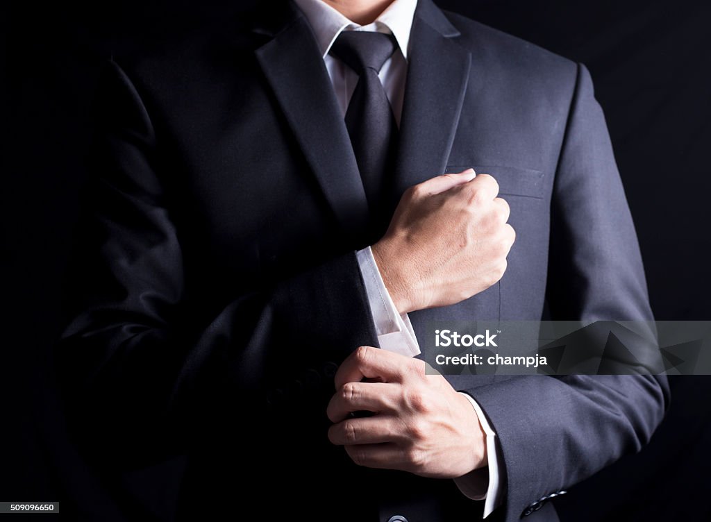 Businessman Fixing Cufflinks his Suit Adjusting Stock Photo