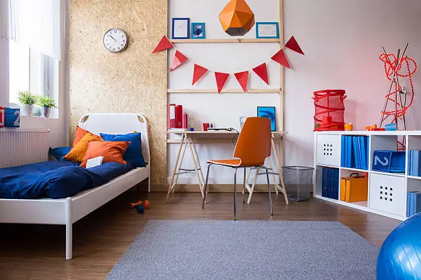 Horizontal view of modern teen boy bedroom