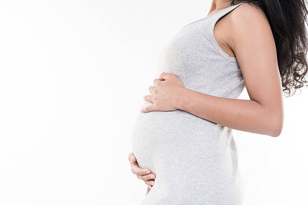 istock asian pregnant woman on white background 509098772