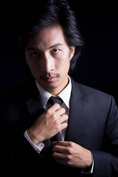 istock Businessman Adjust Necktie his Suit 509099578