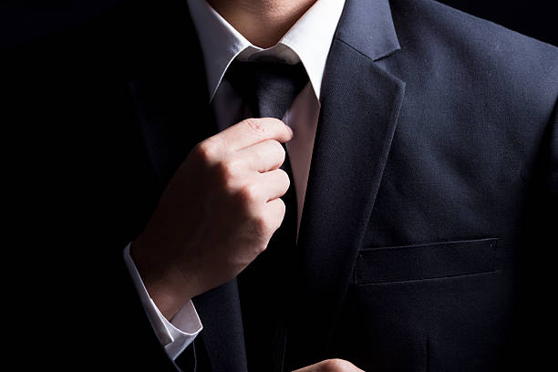 istock Businessman Adjust Necktie his Suit 509100106