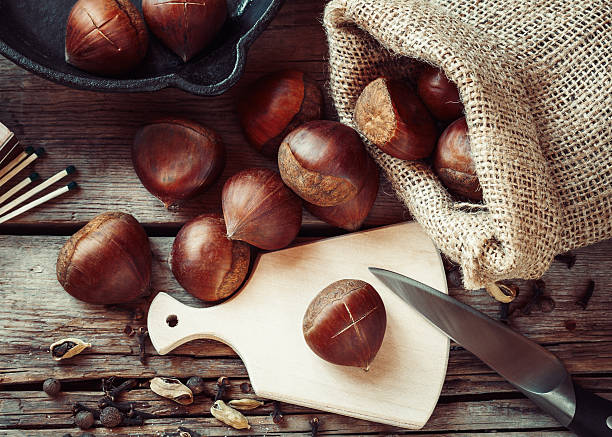 istock Chestnuts ready to roasting and frying pan 509101248