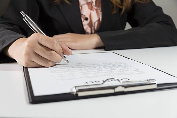 istock Business woman signing contract document form 509102294