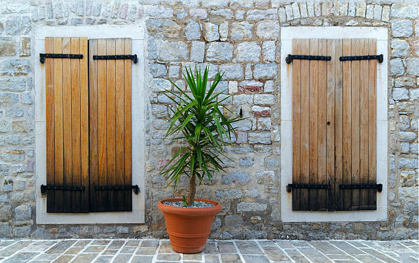 istock windows closed by a wooden shutters 509104688