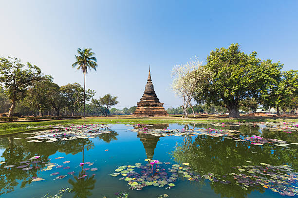 Sukhothai temple lake panorama Wat Mahathat, view of Stupa in Sukhothai temple chiang mai province stock pictures, royalty-free photos & images