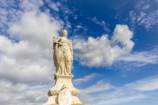 San Rafael statue of the Roman bridge in Cordoba - Spain.