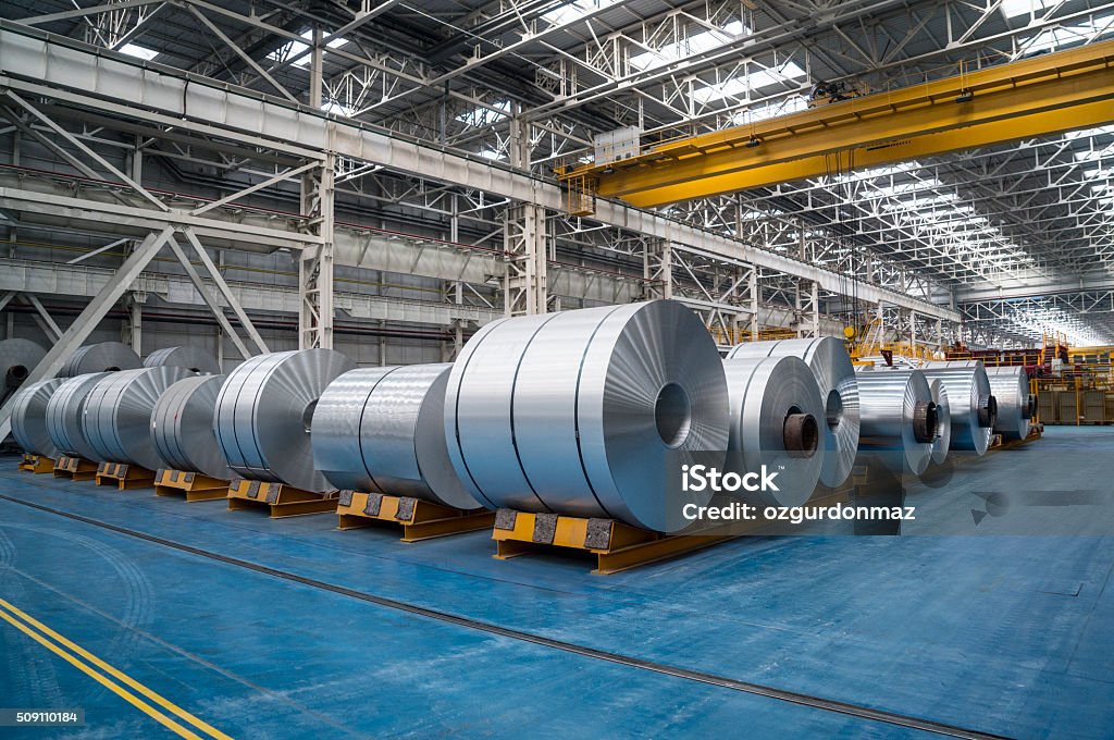 Large Aluminium Steel Rolls Large Aluminum Steel Rolls in the factory. Image taken in daylight with a Sony A7Rii (42 megapixels) and developed from raw..  Aluminum Stock Photo
