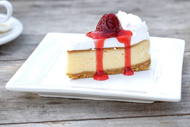 istock Slice of cheesecake with strawberry sauce 509110628