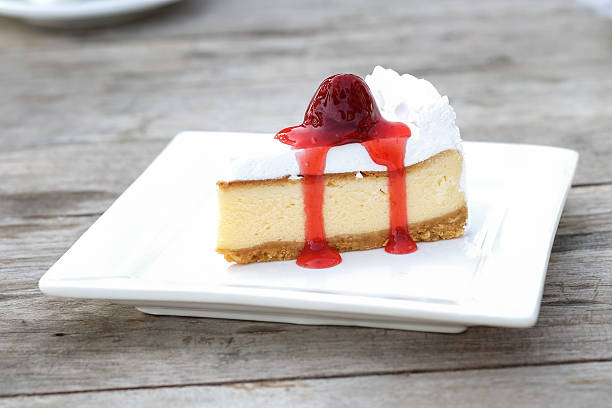 istock Slice of cheesecake with strawberry sauce 509110864