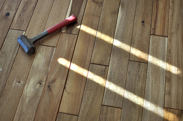 Installing Wood Floor stock photo