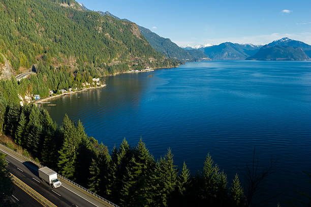 istock Transport truck driving along Highway 99, BC, Canada 509111568