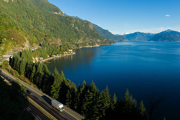 istock Transport truck driving along Highway 99, BC, Canada 509111952