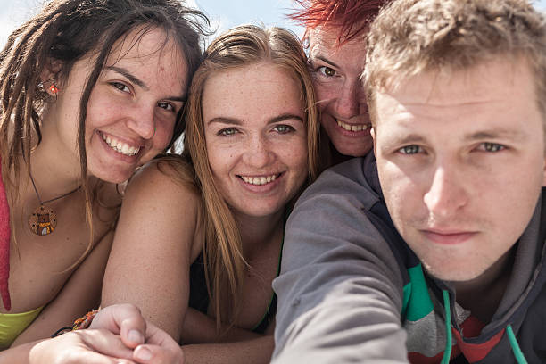 istock Bright teenagers having fun on the beach 509112029