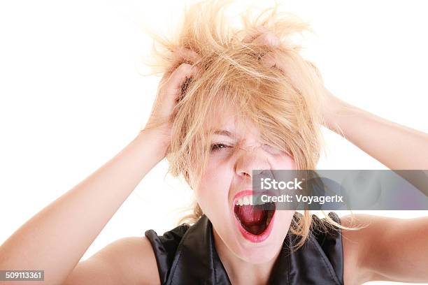 Angry Furious Woman Screaming And Pulling Messy Hair Stock Photo - Download Image Now