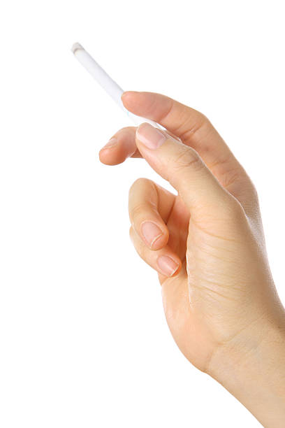 istock Woman hand holding a cigarette 509113515