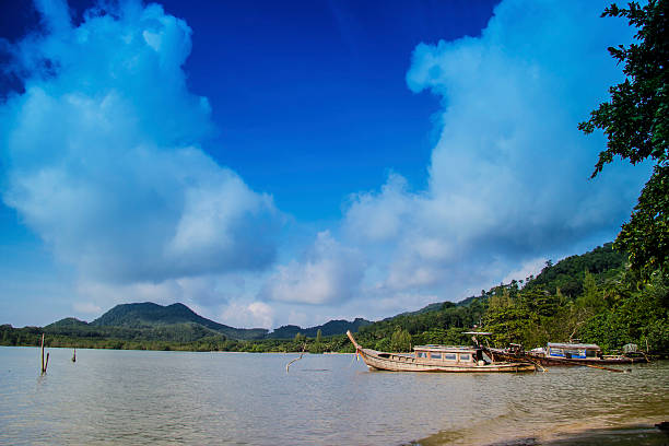 istock thai boats in a paradise beach 509114651