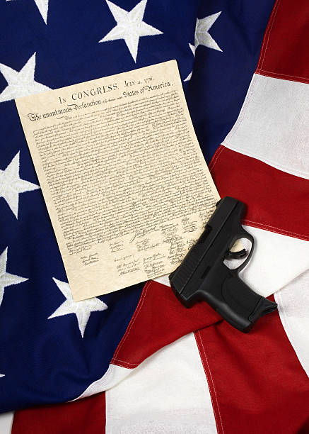istock Declaration of Independence with Hand Gun, Vertical 509114972