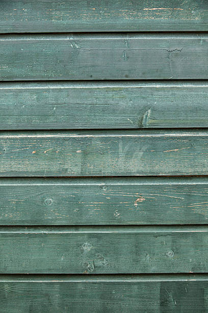 istock background consisting of weathered green grey boards 509115541
