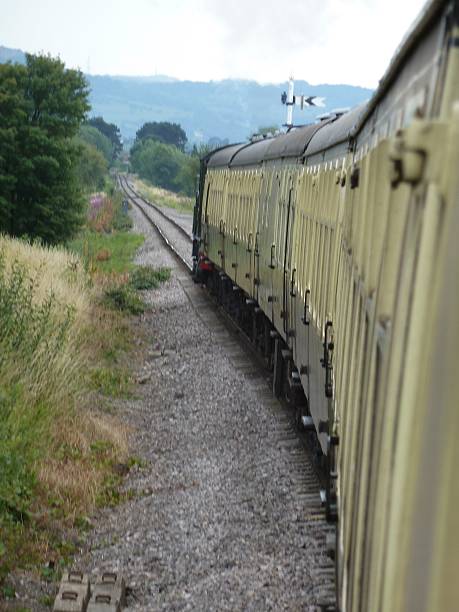istock steam train travelling round a bend on track 509116864
