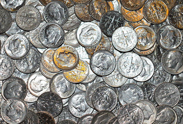I dime at a time Dimes in a pile canadian coin stock pictures, royalty-free photos & images