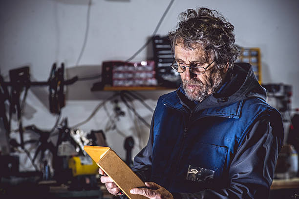 istock Portrait of a Man Using Digital Tablet in Mechanical Workshop 509120824