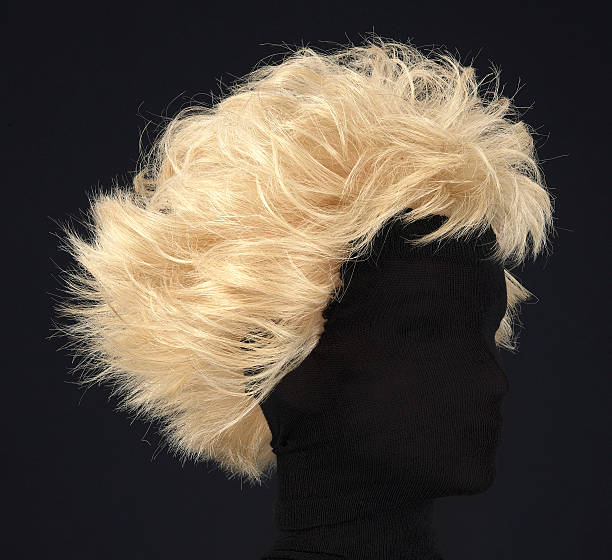 istock blonde wig isolated on black background 509135375