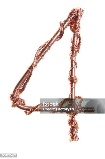 Twisted Copper Wire In The Shape Of A Number Four Stock Photo - Download Image Now - Alphabet, Cable, Copper