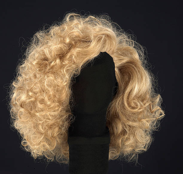 istock blonde wig isolated on black background 509137441