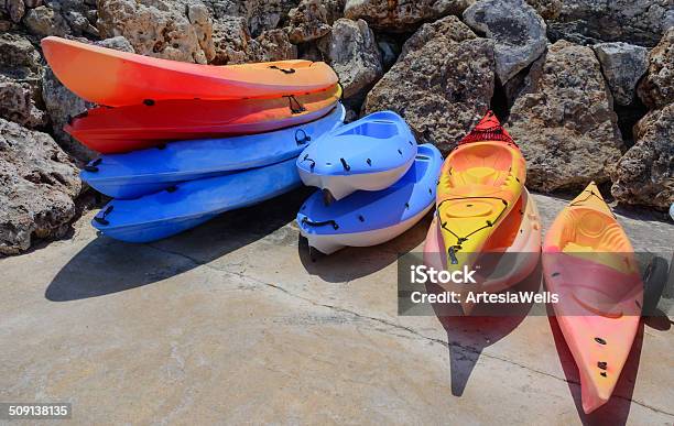 Stacks Of Colorful Kayaks Stock Photo - Download Image Now - Activity, Beach, Canoe