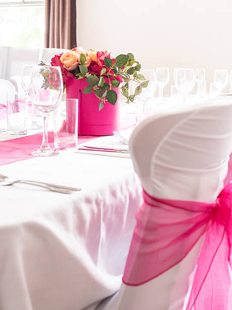 istock Wedding Party Table & Chair covers with pink Sash 509138909
