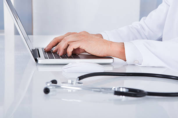 istock Close-up Of Doctor Using Laptop 509139605