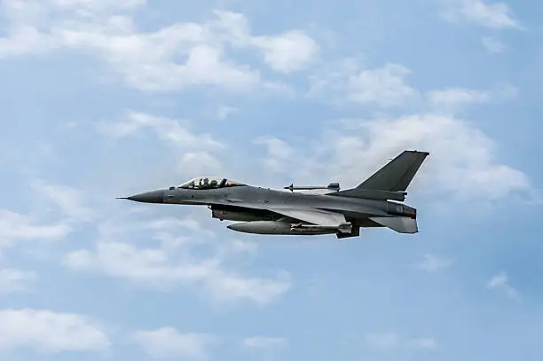 F-16 Falcon Fighter flyby with pilot waving