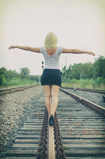 istock Attractive blond woman posing on railway. 509141263