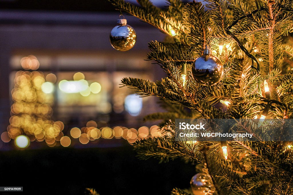 Miniature Christmas Lights Photo of a Christmas tree with light "bokeh" in the background. Christmas Stock Photo