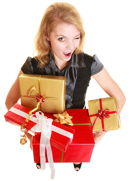 istock holidays love happiness concept - girl with gift boxes 509142371