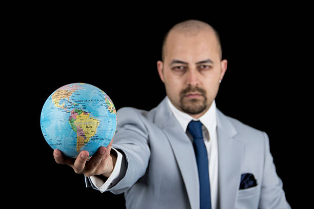 istock man holding world in his hand 509171604