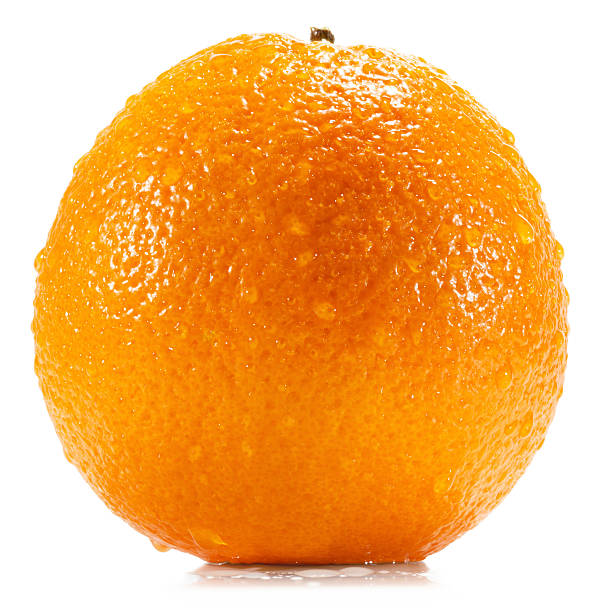 istock orange with water drops isolated on the white background 509172186