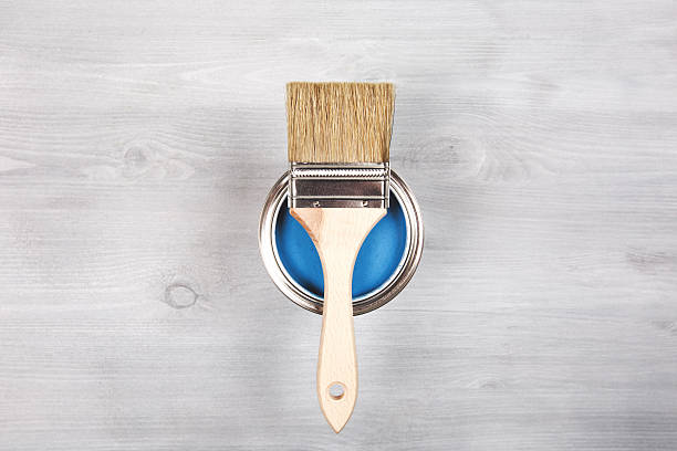 istock Paintbrush and can with paint. Top view 509172278