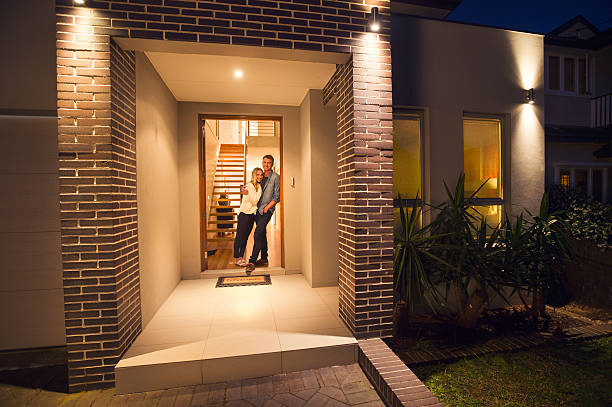 istock Couple standing in front of their new home. 509172656