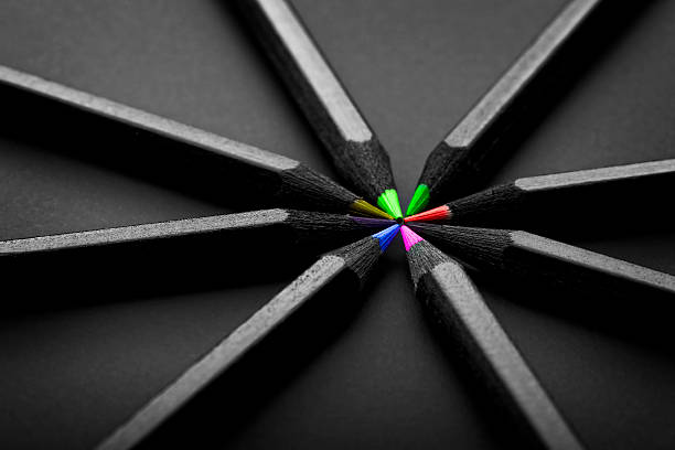 istock Set beautiful black, colored pencils on black background 509172897
