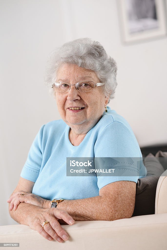 isolated portrait of cheerful and dynamic elderly woman at home isolated portrait of a cheerful and dynamic elderly woman at home Active Lifestyle Stock Photo