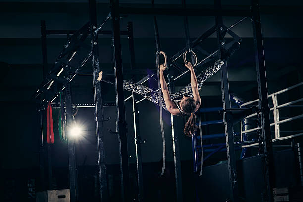 istock Young woman in a cross training rack 509173960