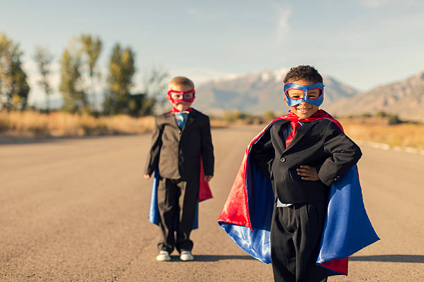 istock Two Business Boys Dressed in Superhero Costumes 509174374