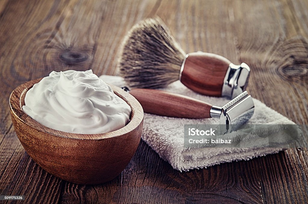 Shaving accessories Shaving accessories on wooden background Shaving Stock Photo