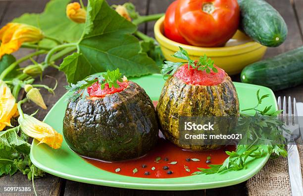 Zucchinis With Tomato Caps Stock Photo - Download Image Now - Cooking, Crockery, Curve