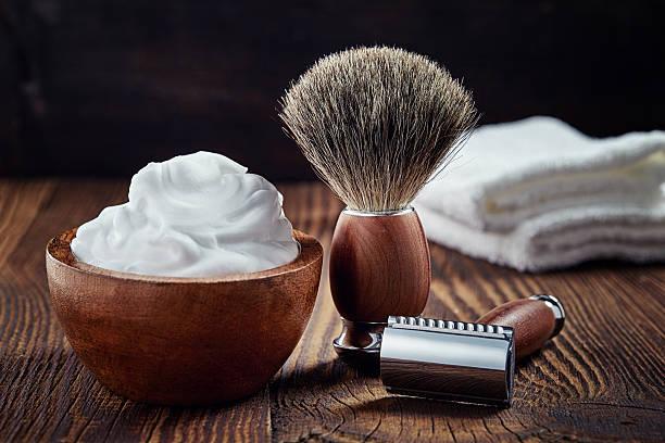 Shaving accessories Shaving accessories on wooden background shaving stock pictures, royalty-free photos & images