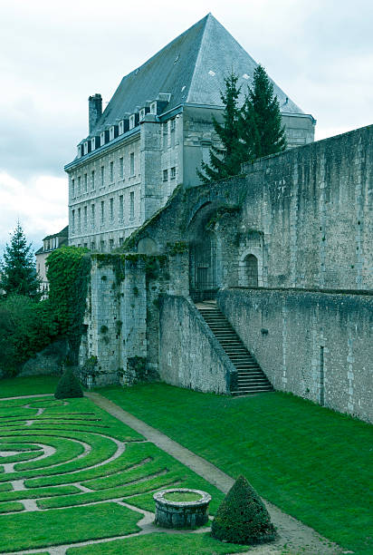 istock Labyrinth and wall with building in medieval town of Chartres 509175561