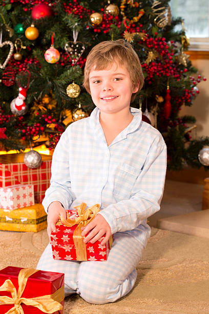 istock Boy With Christmas Gifts 509176583