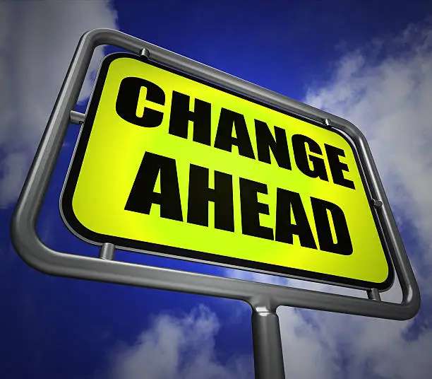 Photo of Change Ahead Signpost Refers to a Different and Changing Future